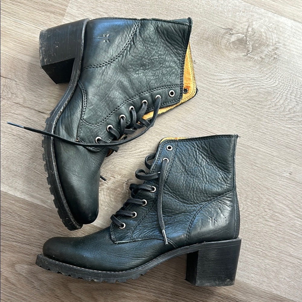 Black Combat Boots with Lace-Up Design and Chunky Heel